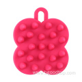 Four-leaf clover shaped silicone shampoo comb